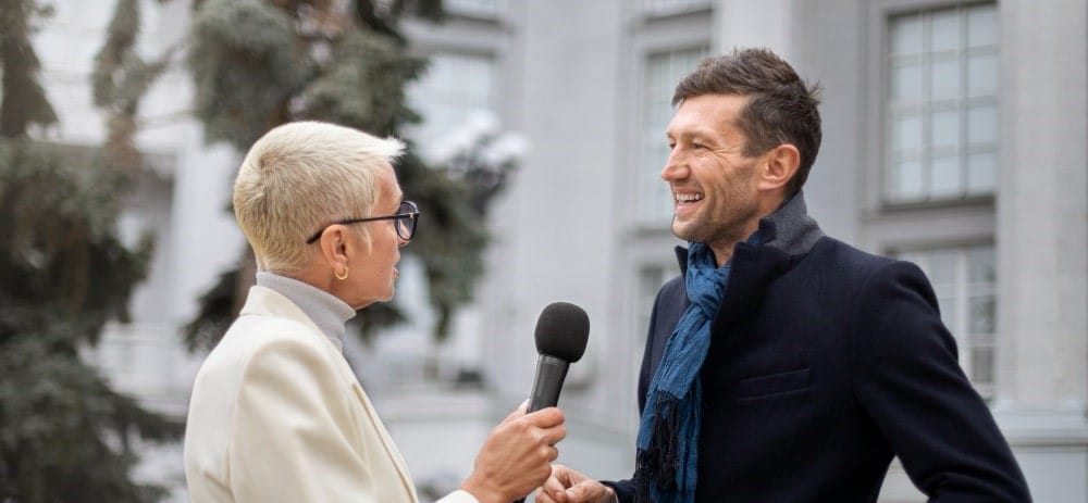 two people are speaking